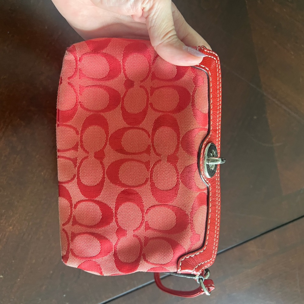 Coach Red Clutch with Signature Pattern
